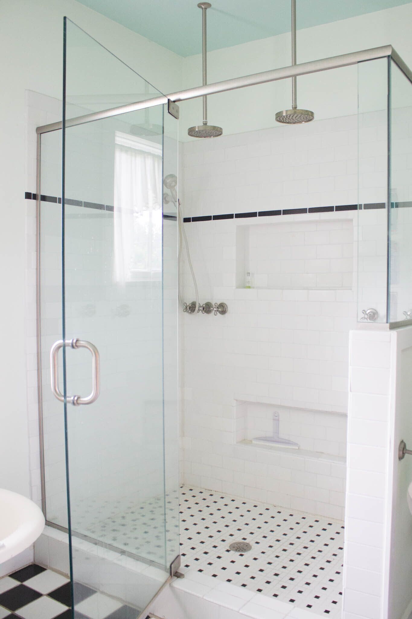Bathtub, hair dryer, towels, toilet paper