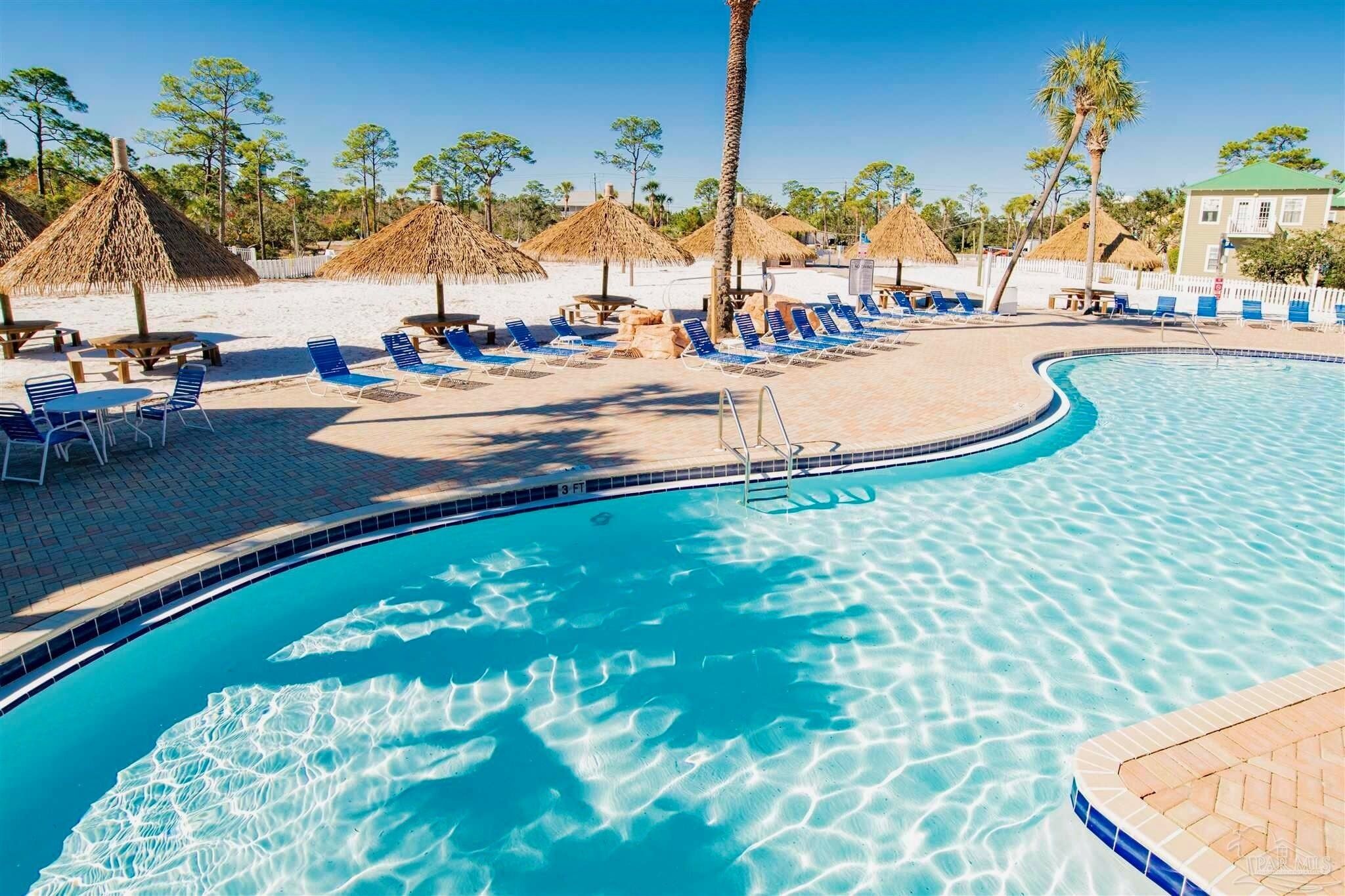 Stunning Condo Retreat: Spectacular Poolside Luxury Steps from the Beach