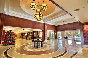 Grand resort lobby with soaring ceilings, elegant finishes, and a warm aloha welcome upon your arrival - Honua Kai | Ocean View Studio | Car Incl. w/ 6+ Nights | HKH-423 by KBM (Lahaina)