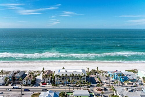 Elegant Beachfront Condo w/pool!  Walking distance to many restaurants and shops