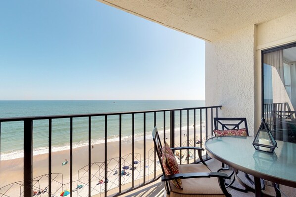 Outdoor dining - Renovated beachfront condo with pool & ocean views - snowbird-friendly (Myrtle Beach)