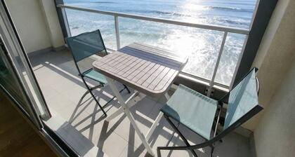 Studio with balcony, WIFI, and parking near the beach