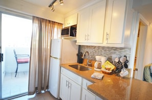 Fridge, microwave, coffee/tea maker, toaster