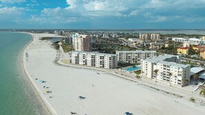 A coastal hotel with multiple buildings, a beach, and a view of the ocean. - Dreamy Island Getaway for Two! 1B/1B Beachfront Vacation Condo at Leonardo Arms With Fantastic Views! (Fort Myers Beach)