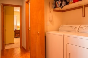 Convenient laundry facilities feature a washer and dryer.