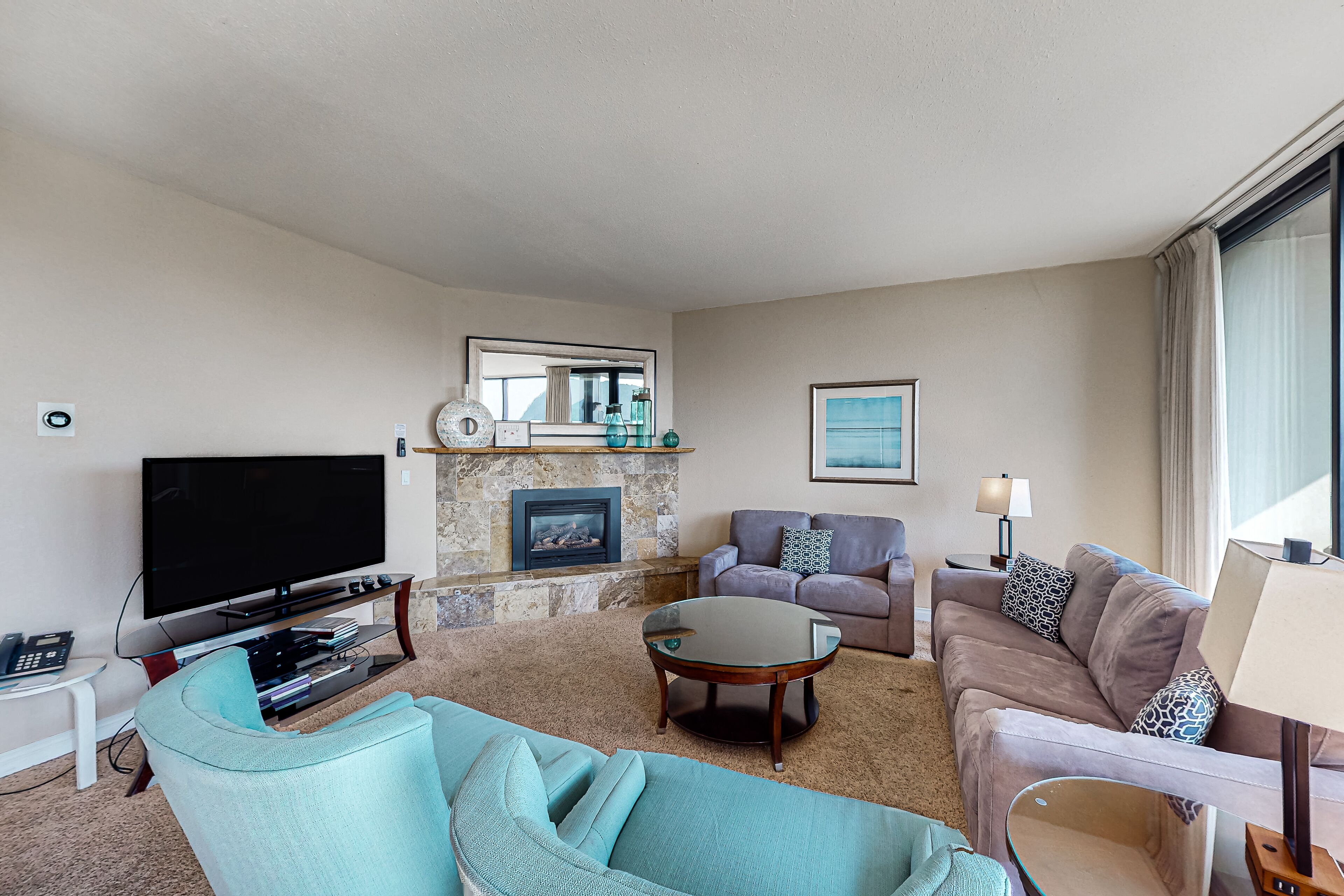 5th-floor condo with partial ocean view & beach access steps away
