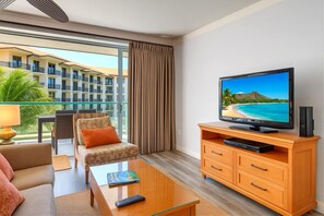 Tropical views inside and out, unwind in comfort while Hawaii plays on screen and paradise waits just beyond your balcony.