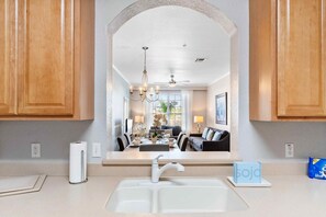 Fully equipped with kitchen accessories and boasting ample storage, this culinary haven is designed for both efficiency and elegance. - Magical 3BR Condo near Epic Universe! (Orlando)