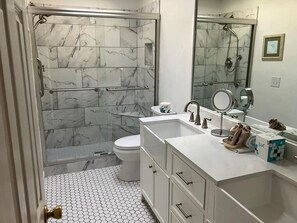Bathtub, hair dryer, towels