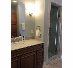 Shower, hair dryer, towels, soap