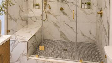 Bathtub, jetted bath, hair dryer, towels