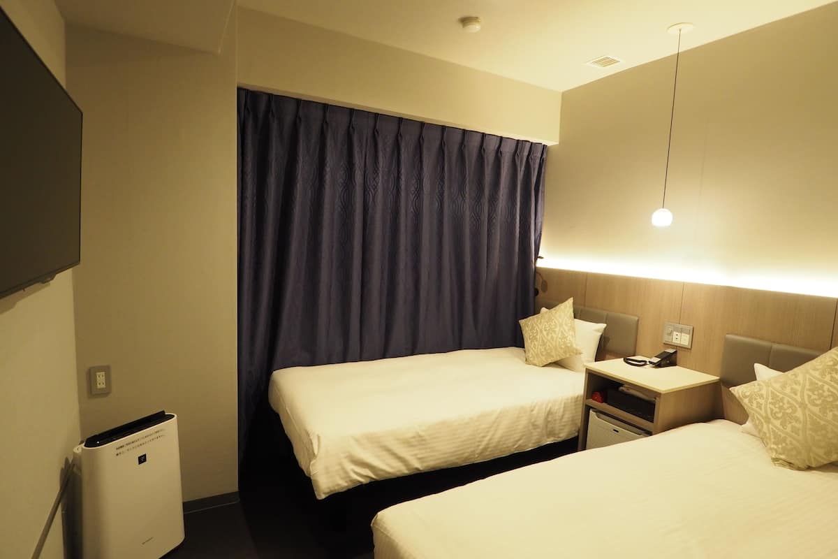 compact twin room | desk, blackout curtains, iron/ironing board, free wifi