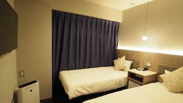 Compact Twin Room | Desk, blackout drapes, iron/ironing board, free WiFi