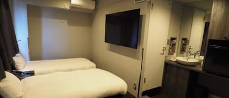 Triple Room | Desk, blackout drapes, iron/ironing board, free WiFi