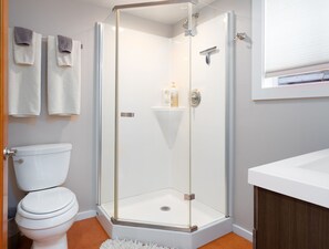 Shower, hair dryer, towels, soap - Modern Garden Oasis by CosiDesign (Eugene)