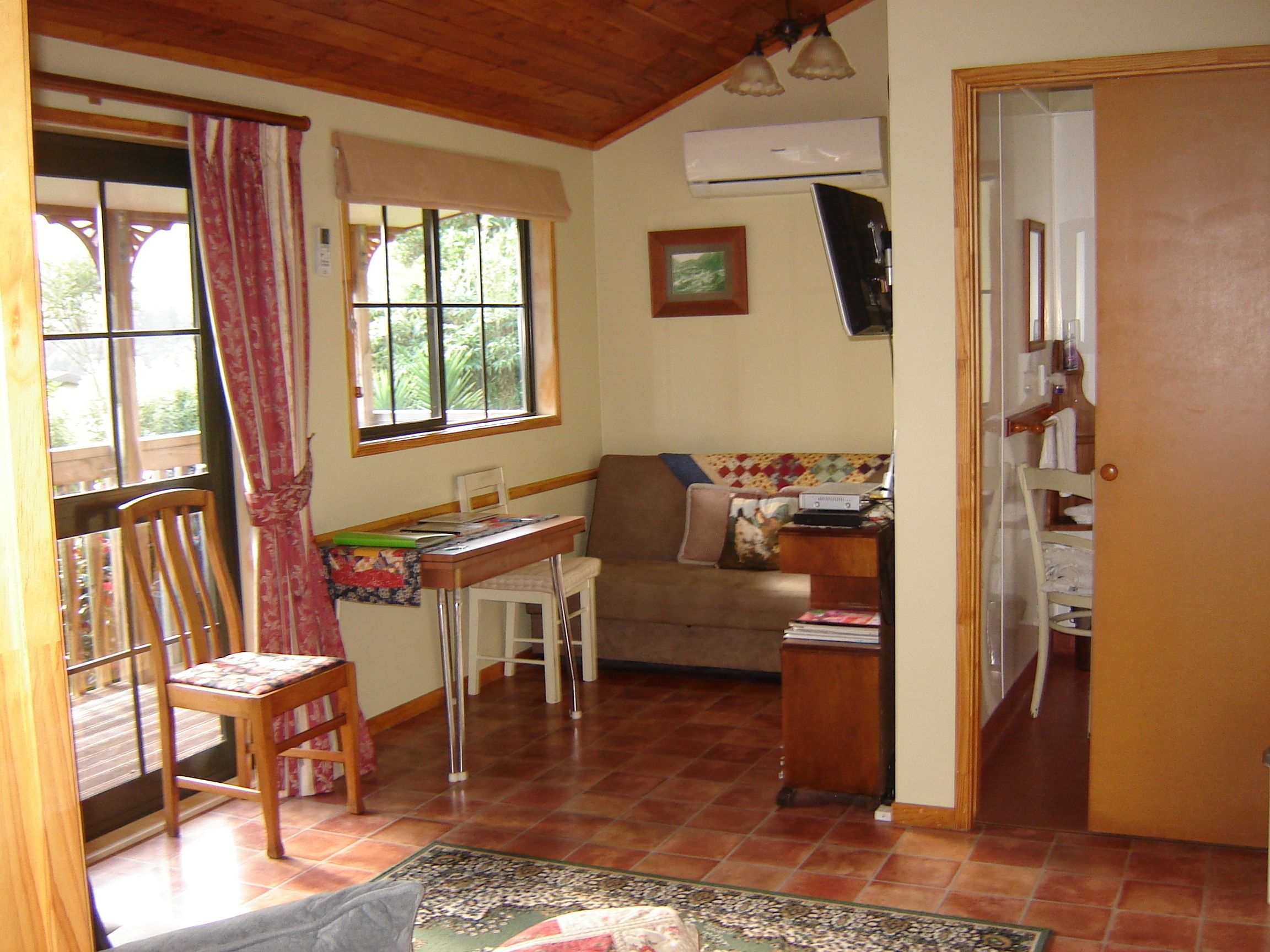Family Cottage, 1 Bedroom | Living area | Flat-screen TV, DVD player