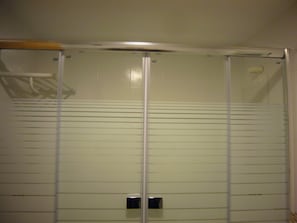 Bathtub, towels, toilet paper