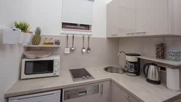 Departamento, 2 habitaciones | Cocineta privada | Refrigerador, microondas, parrilla de estufa y lavavajillas