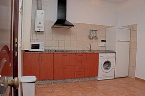 Fridge, microwave, stovetop, cookware/dishes/utensils