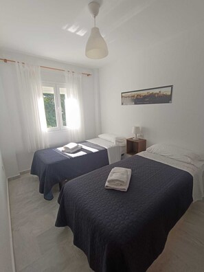 2 bedrooms, iron/ironing board, WiFi, bed sheets