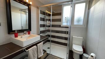 Shower, hair dryer, towels, soap