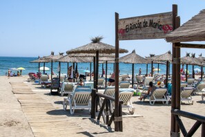 Sun-loungers, beach towels