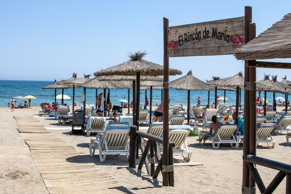 Sun-loungers, beach towels