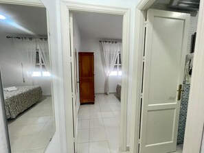 1 غرفة نوم ومكواة/لوح كي وواي فاي وملاءات أسرّة