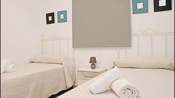 2 dormitorios, tabla de planchar con plancha, wifi y ropa de cama