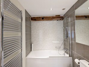 Combined shower/tub