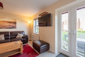 Smart-TV, DVD-spiller, bøker og filmbibliotek