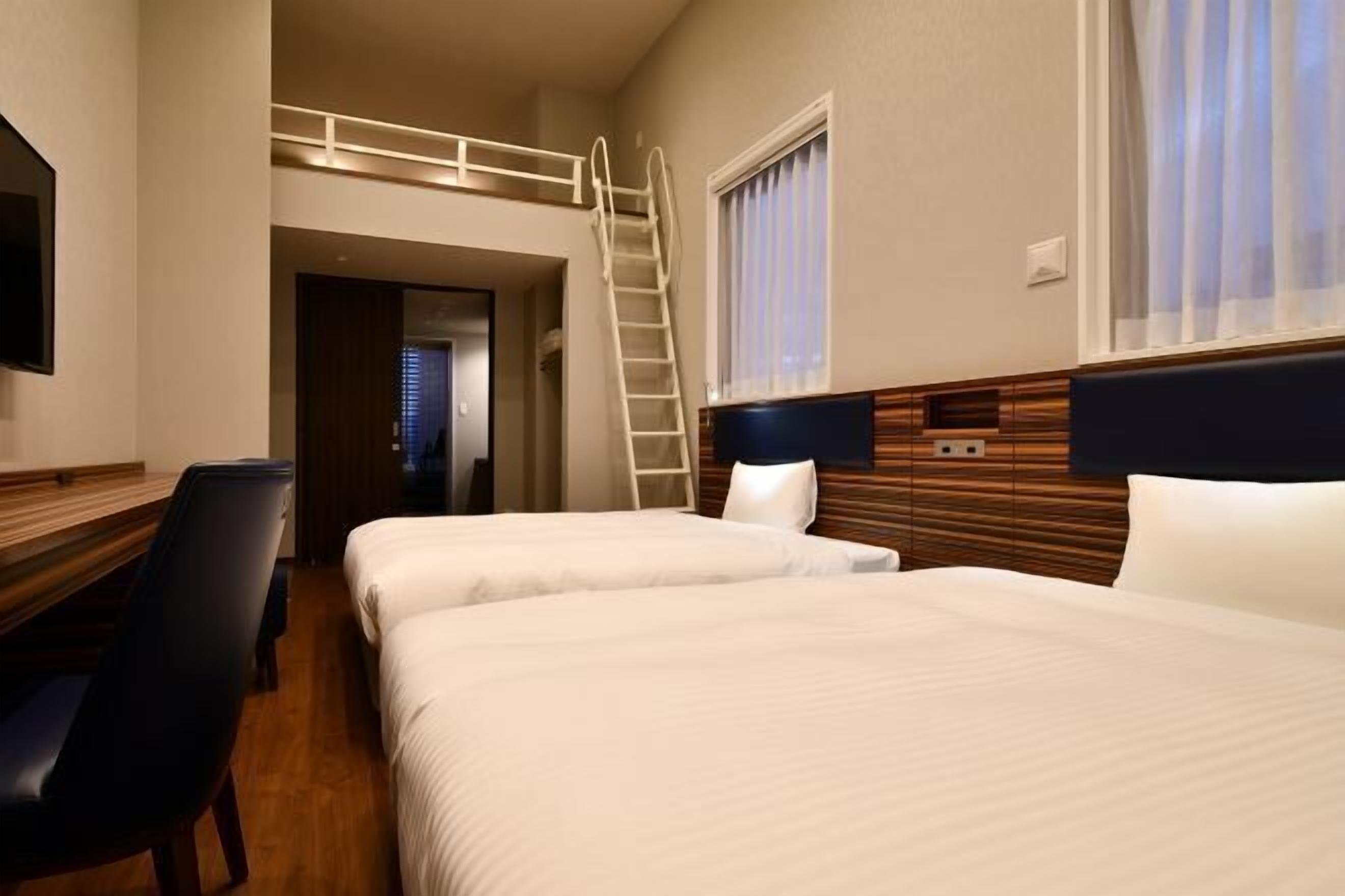 Down duvets, desk, laptop workspace, blackout curtains