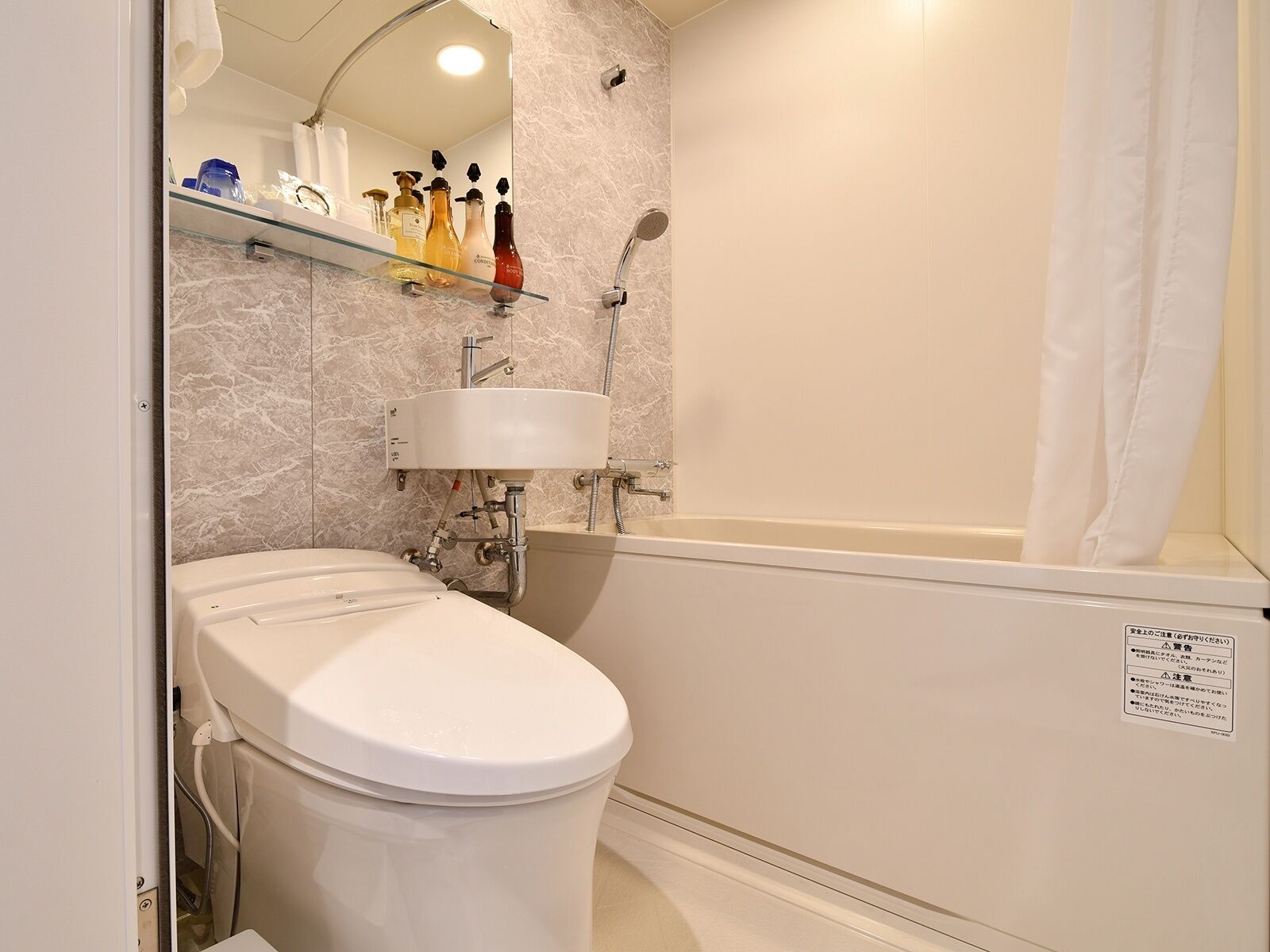 free toiletries, hair dryer, slippers, bidet