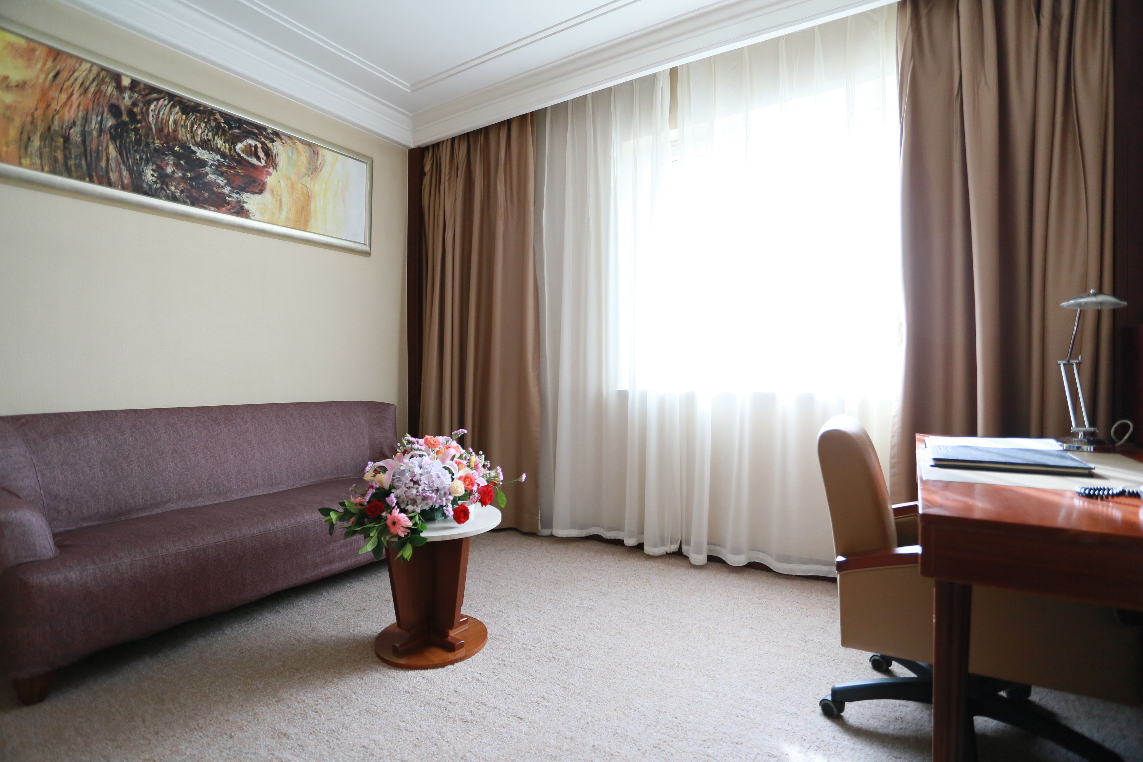 economy suite, 1 bedroom, private bathroom, city view | minibar, in-room safe, desk, blackout curtains