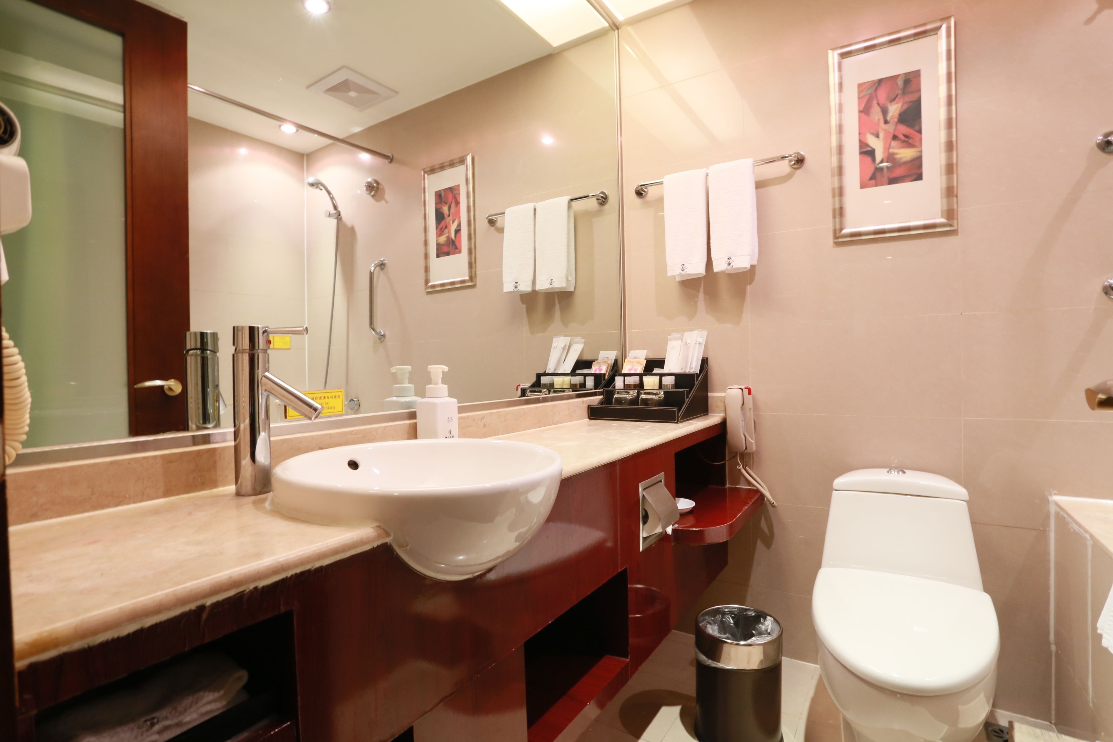 executive suite, 1 bedroom, 2 bathrooms, city view | bathroom | shower, free toiletries, hair dryer, slippers
