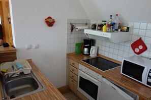 Refrigerador, microondas, horno y lavavajillas 