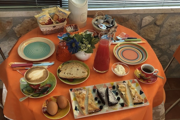 Free daily local cuisine breakfast