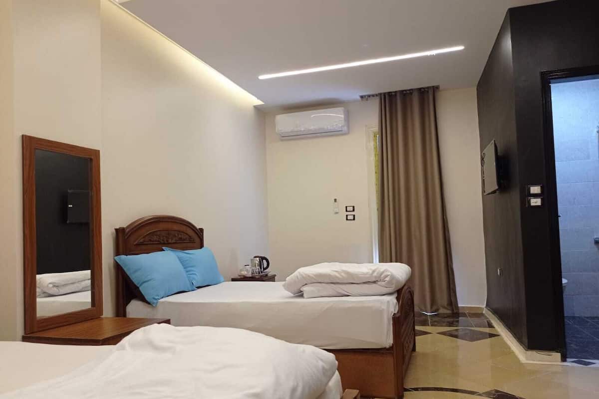 Standard Triple Room | 1 bedroom, individually decorated, laptop workspace, blackout drapes