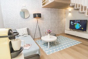 Apartamento premium (Cleaning Fee Included) | Área de estar