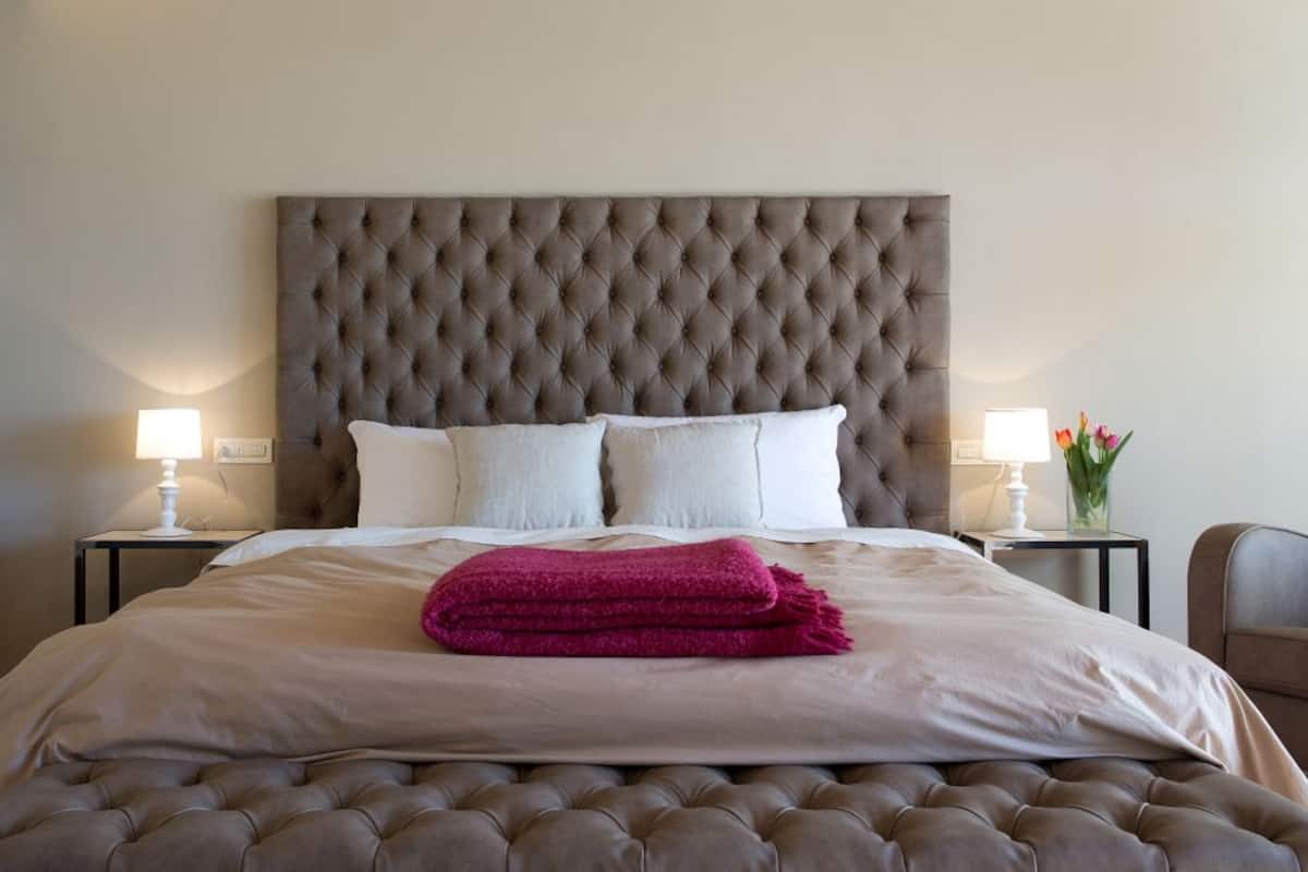 Junior suite, uitzicht op wijngaard | 1 slaapkamer, gratis wifi, beddengoed