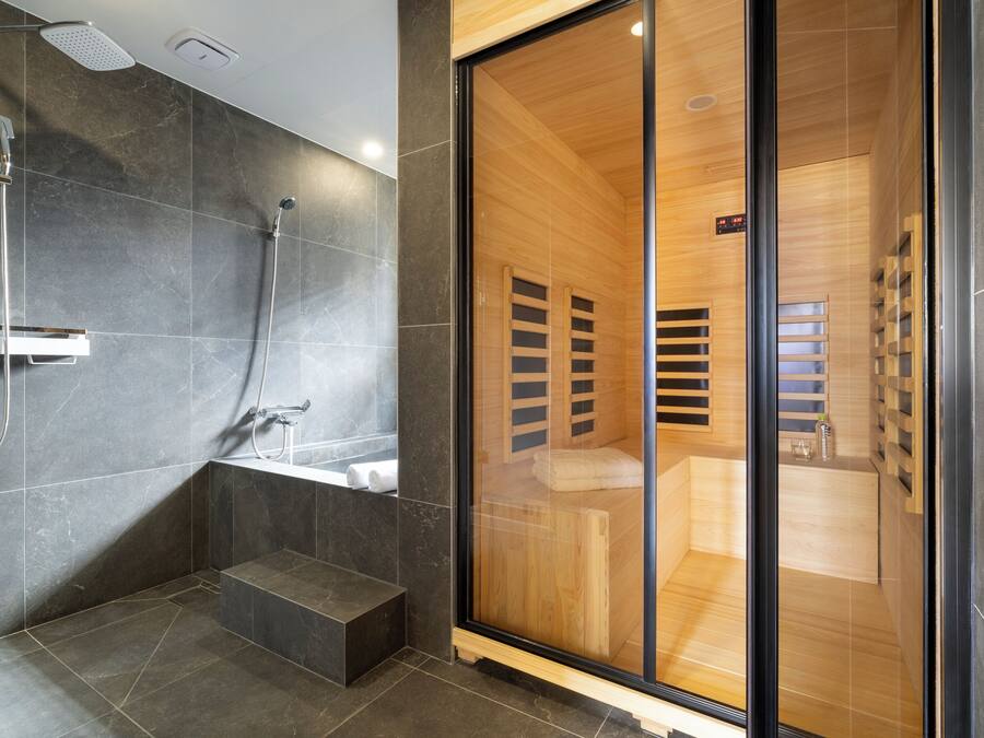 Presidential Studio Suite, Multiple Beds, Hot Tub | Bathroom | Hair dryer, bathrobes, slippers, towels