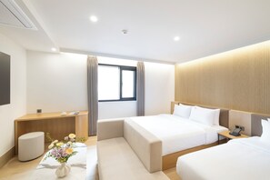 Chambre Deluxe avec lits jumeaux, plusieurs lits, bain à remous