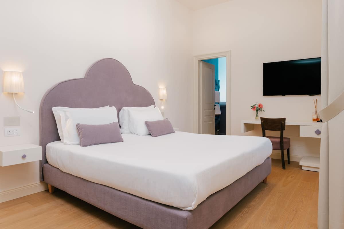 Signature kamer | Een minibar, een kluis op de kamer, individueel gemeubileerd, een bureau