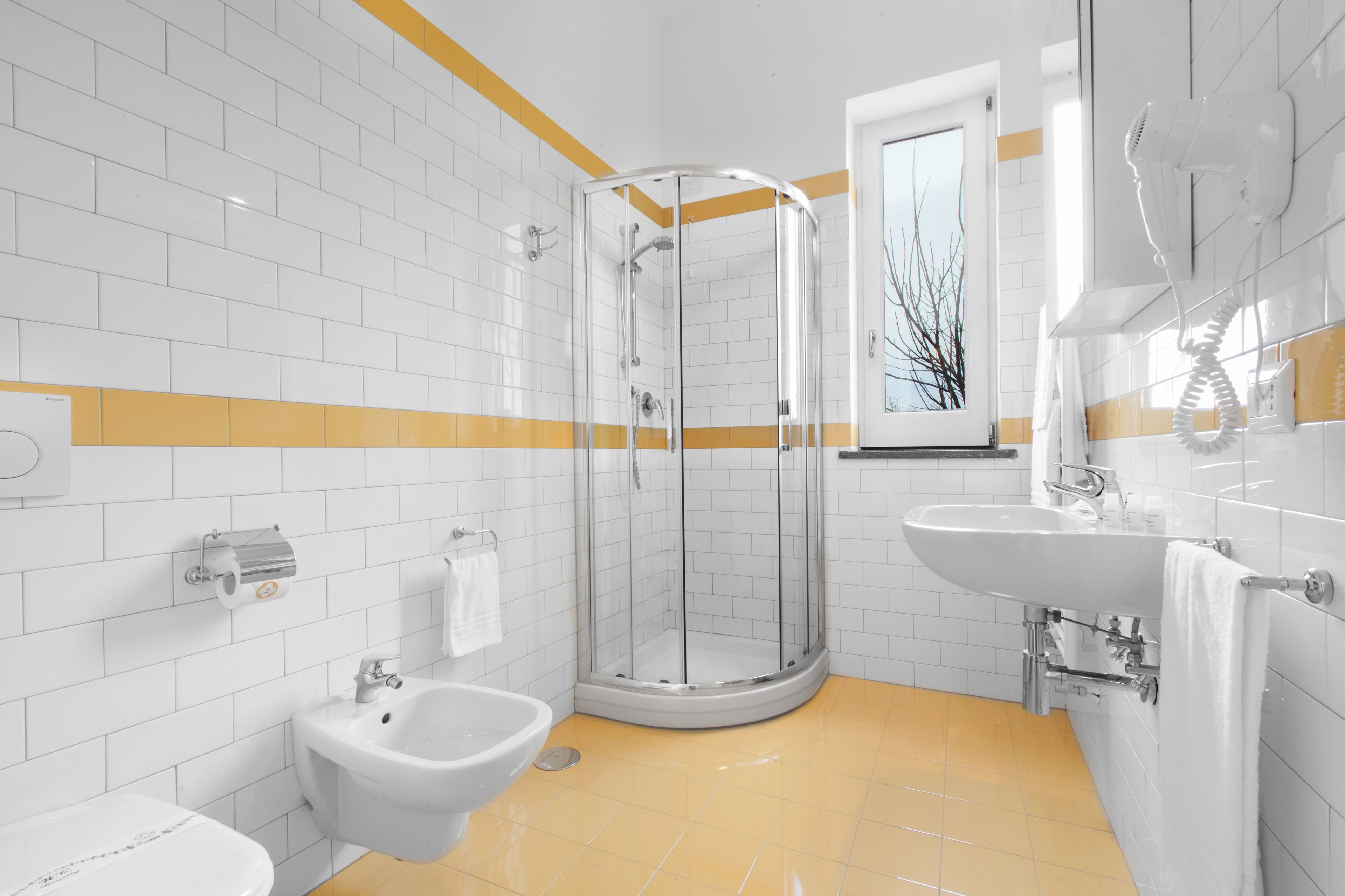 family room | bathroom | shower, designer toiletries, hair dryer, slippers