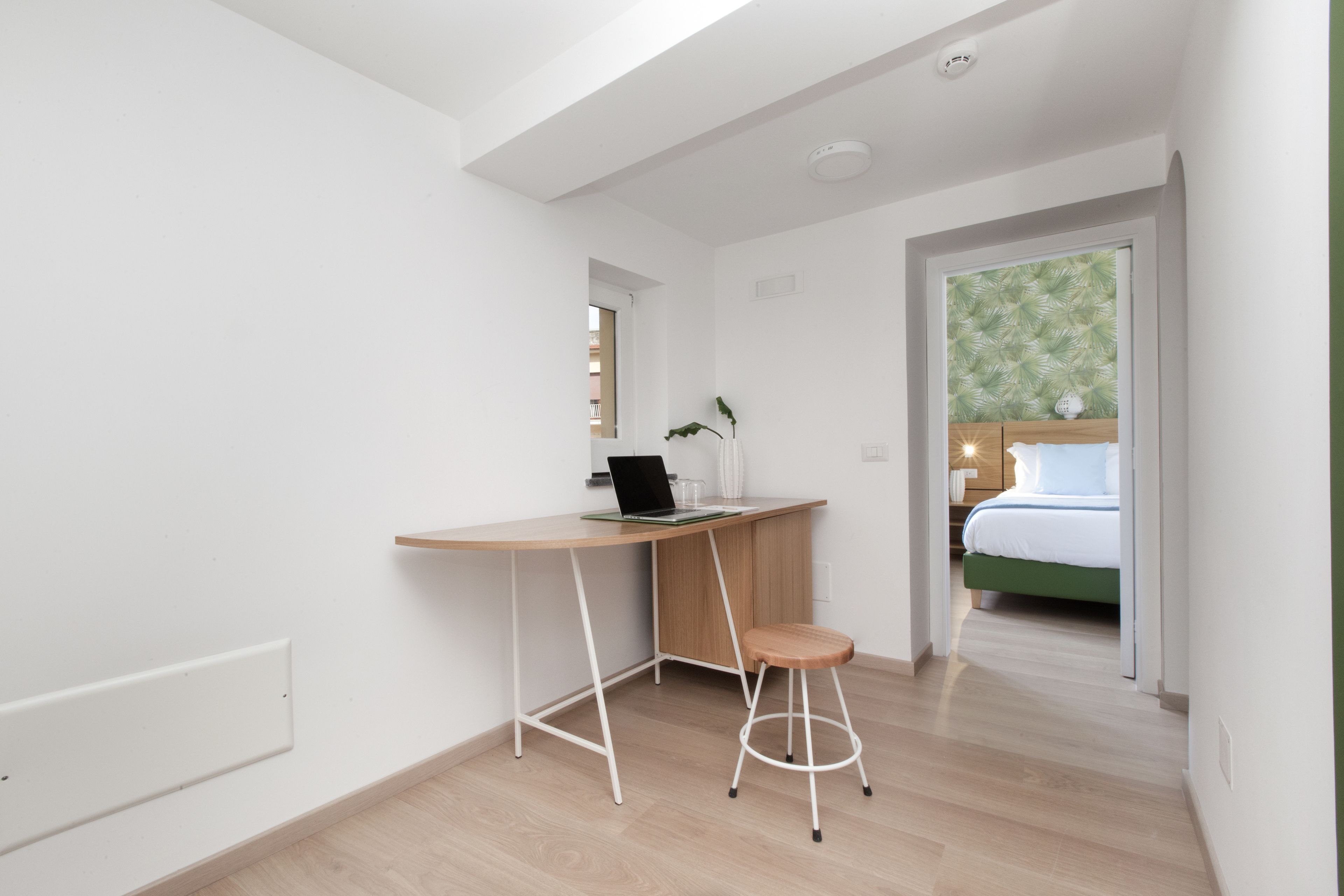 family room | 2 bedrooms, minibar, in-room safe, desk