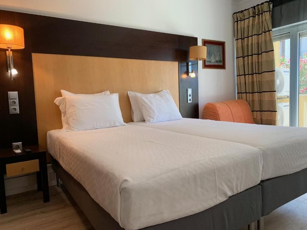 Family Studio, 1 Bedroom | Minibar, individually decorated, individually furnished, blackout drapes