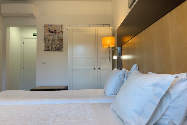 Superior Twin Room, Private Bathroom, Ground Floor | Individually decorated, individually furnished, desk, laptop workspace