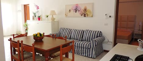 Appartement (Orchidea) | Coin séjour