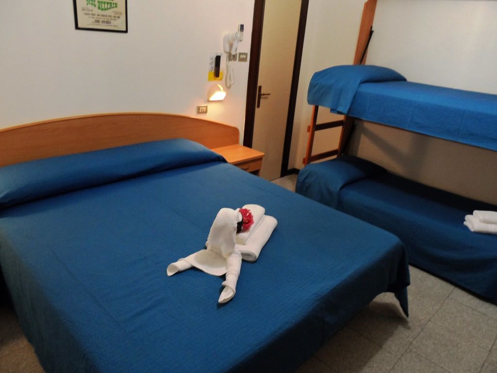 basic quadruple room | in-room safe, desk, free wifi, bed sheets