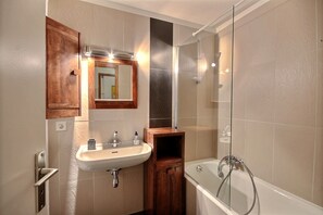 Bathtub, hair dryer